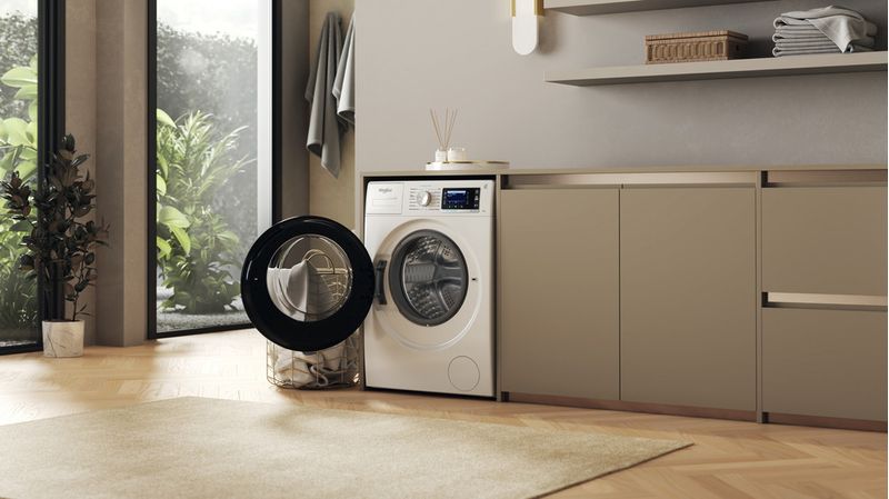 Whirlpool Lave-linge Pose-libre W6 98 SILENCE FR Blanc Lave-linge frontal A Lifestyle perspective open