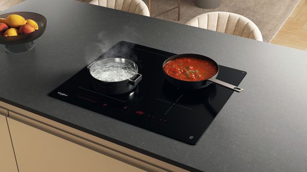 Whirlpool Table de cuisson WLX6001DNFF Noir Induction vitroceramic Lifestyle perspective